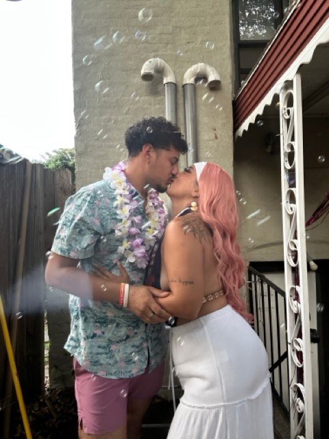 Fernando and Gigi Kissing